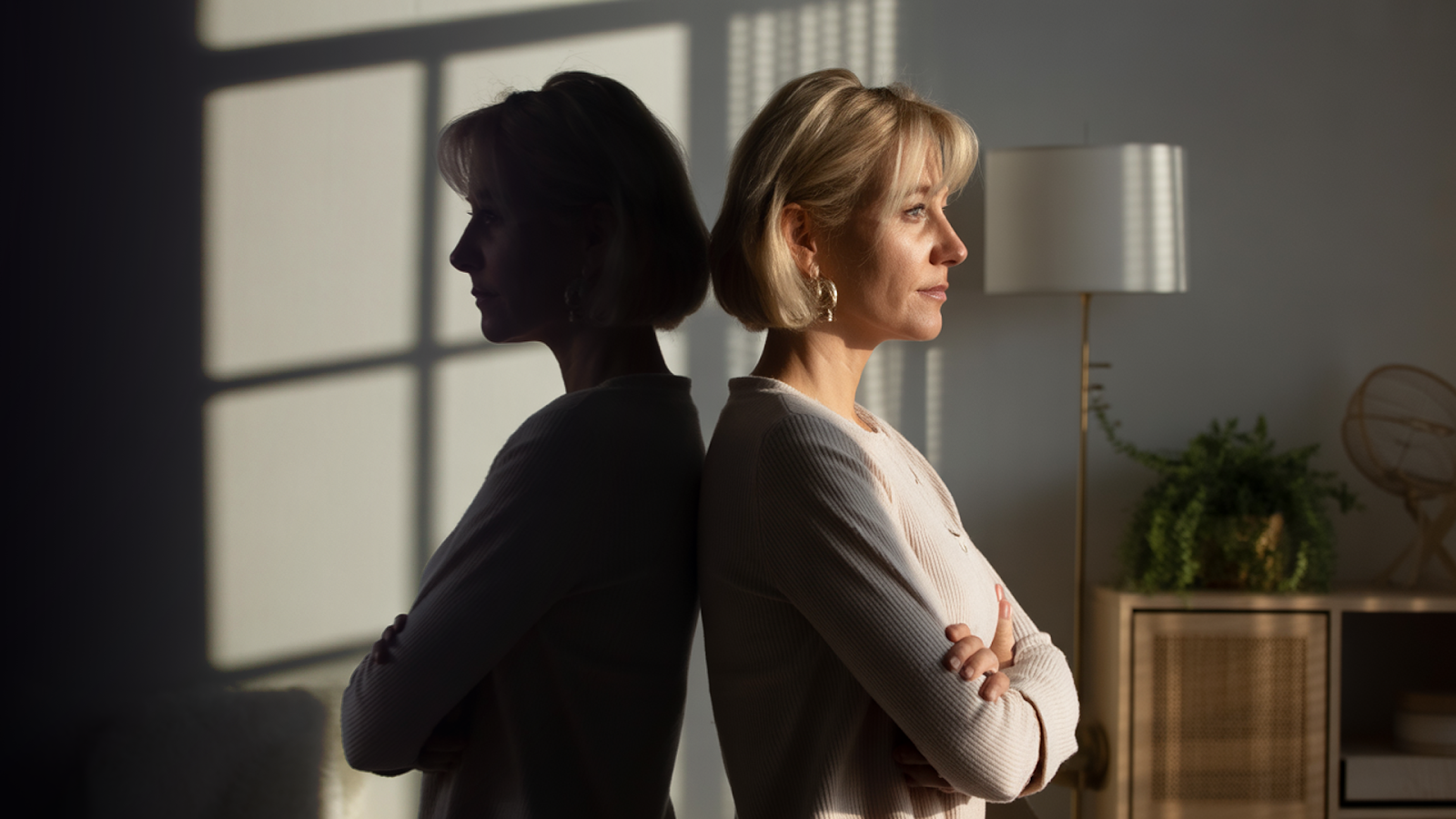 Woman thinking about her shadow self